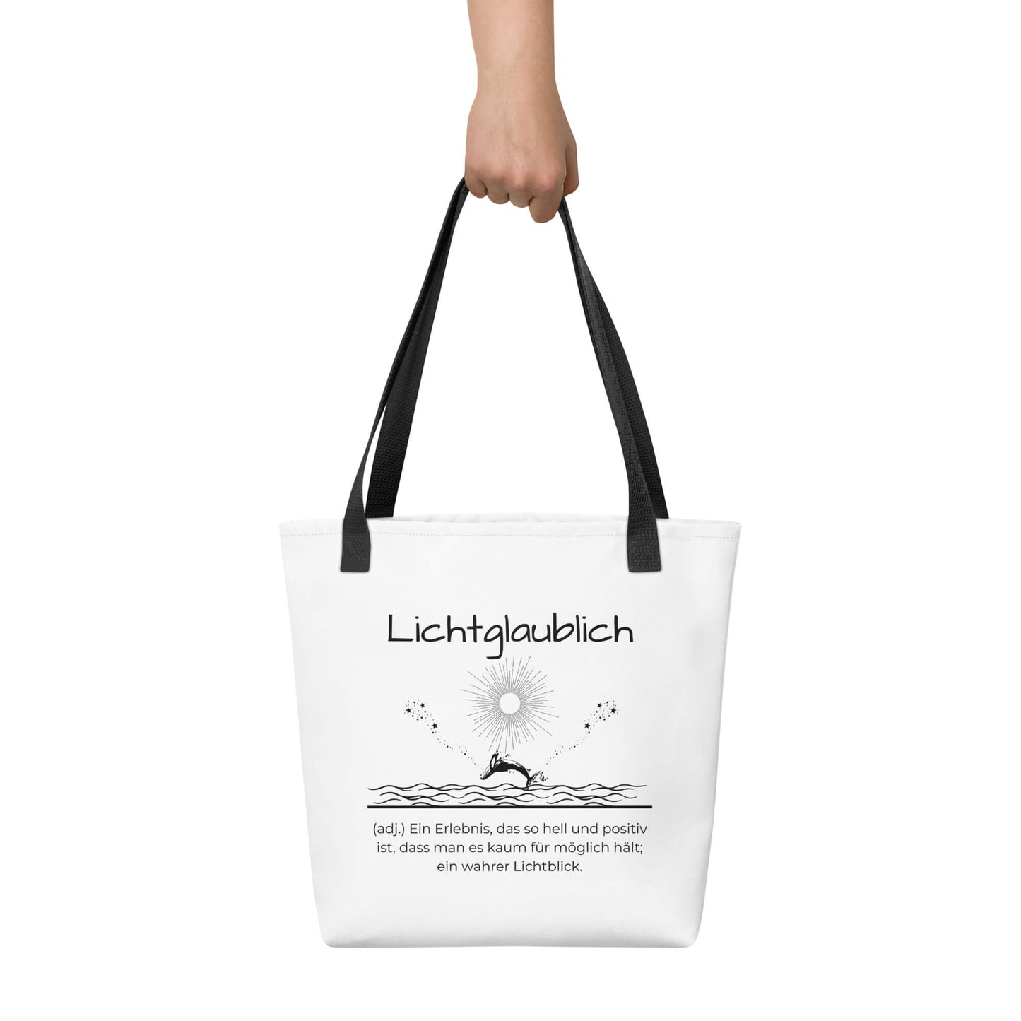 Lichtglaublich - Stofftasche in Black -White aus Polyester und Baumwolle - Premium Edition - Frontansicht haltend in Hand mit schwarzem Print