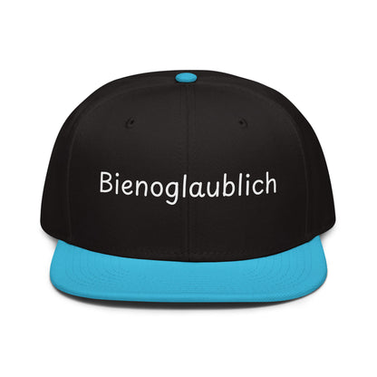 Bienoglaublich Snapback Cap in Schwarz - Blau aus Acryl-Woll-Mix - neues Wort für Leichtigkeit und Wachstum - Front - Wortstolz Design