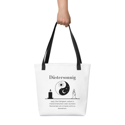 Düstersonnig - Stofftasche in Black -White aus Polyester und Baumwolle - Premium Edition - Frontansicht haltend in Hand mit schwarzem Print