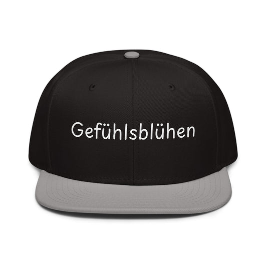 Gefühlsblühen Snapback Cap in Schwarz - Grau aus Acryl-Woll-Mix - neues Wort für Emotionen und Wohlbefinden - Front - Wortstolz Design