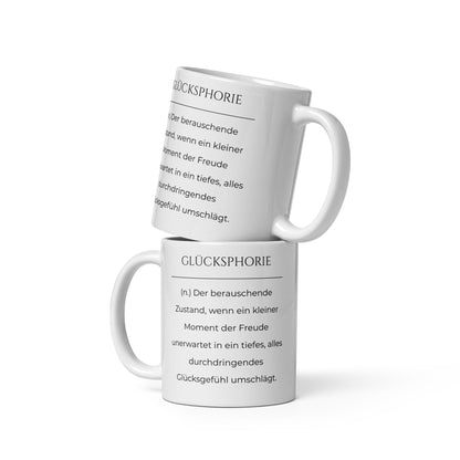 Glücksphorie Keramiktasse in Weiß - neues Wort für Freude und Glück - Zwei Tassen übereinander - Frontansicht mit Henkel links und rechts - Wortstolz Design