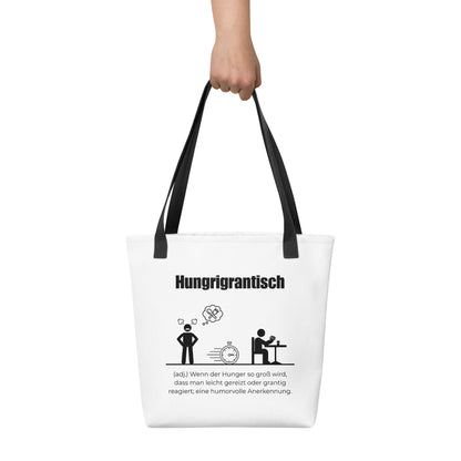 Hungrigrantisch - Stofftasche in Black -White aus Polyester und Baumwolle - Premium Edition - Frontansicht haltend in Hand mit schwarzem Print