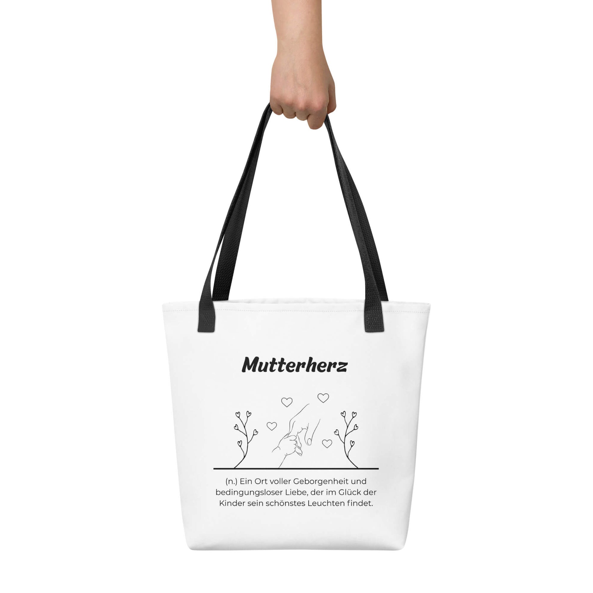 Geschenk Stofftasche - Mutterherz Tasche in Weiß-Schwarz aus Polyester und Baumwolle - Premium Edition - Frontansicht haltend in Hand mit schwarzem Print