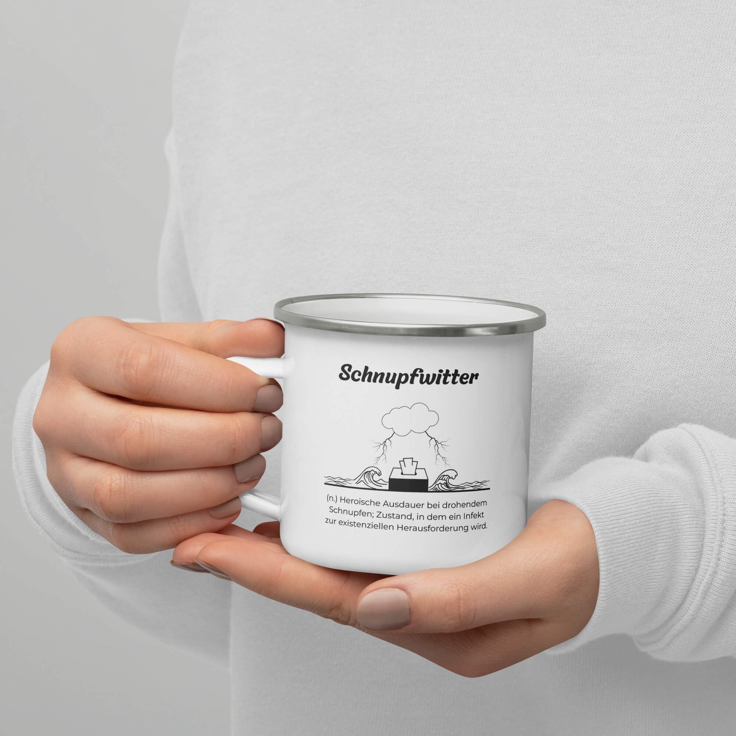 Geschenk Tasse - Schnupfwitter Emailletasse in Weiß - Premium Edition  - Frontansicht auf Hand mit schwarzem Print - Henkel rechts