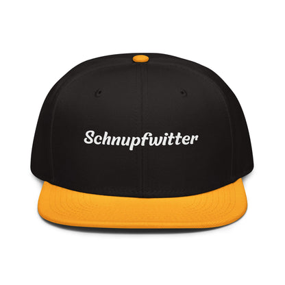 Geschenk Cap - Schnupfwitter Snapback Cap in Schwarz-Gold - Res5 Edition - mit weißem Print - Frontansicht