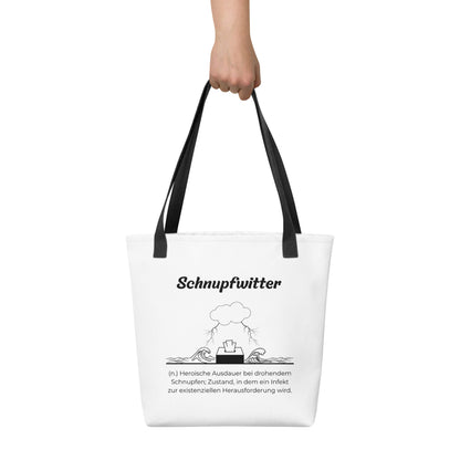 Geschenk Stofftasche - Schnupfwitter Tasche in Weiß-Schwarz aus Polyester und Baumwolle - Premium Edition - Frontansicht haltend in Hand mit schwarzem Print