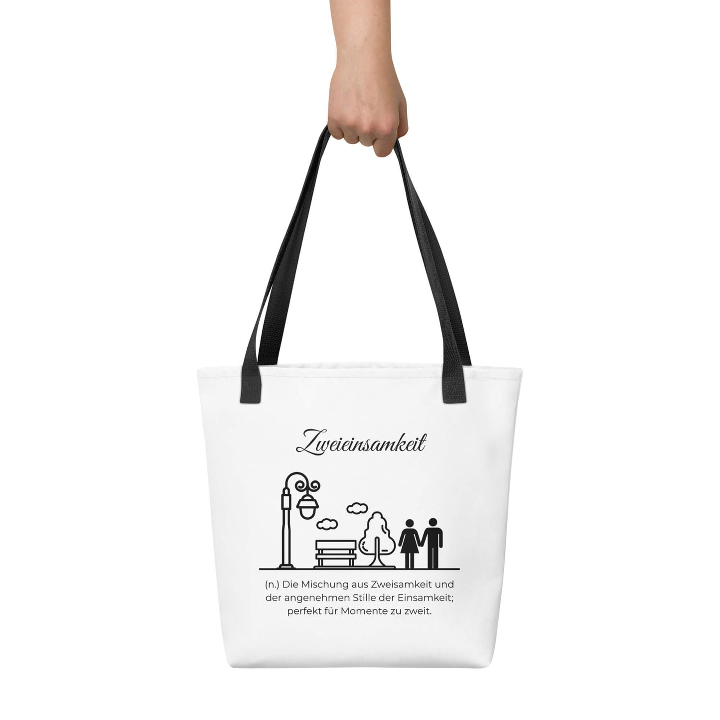 Zweieinsamkeit - Stofftasche in Black -White aus Polyester und Baumwolle - Premium Edition - Frontansicht haltend in Hand mit schwarzem Print