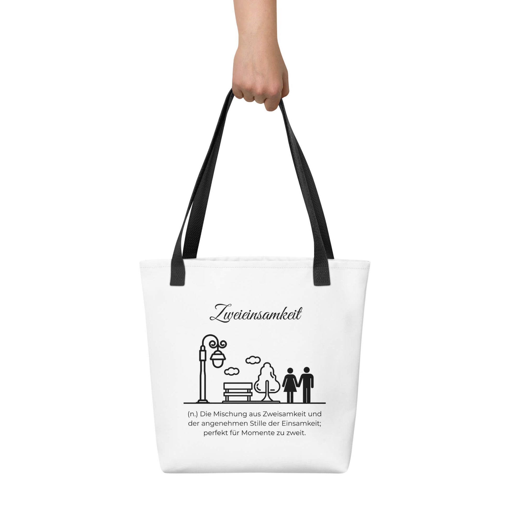 Zweieinsamkeit - Stofftasche in Black -White aus Polyester und Baumwolle - Premium Edition - Frontansicht haltend in Hand mit schwarzem Print